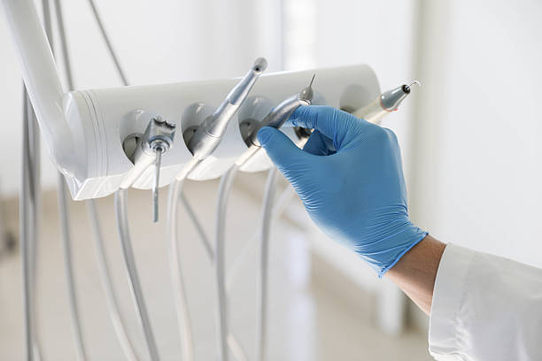 Professional Tooth Extraction technician working in Falls City, OR